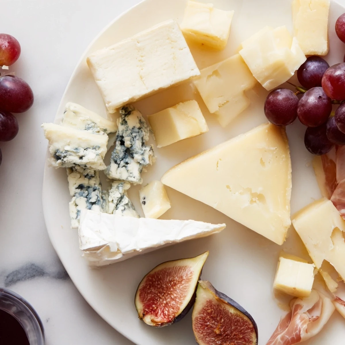 A beautiful Moments Magiques Plateau Bonne Année 2026 appetizer platter, overflowing with cheeses, fruits, and meats.