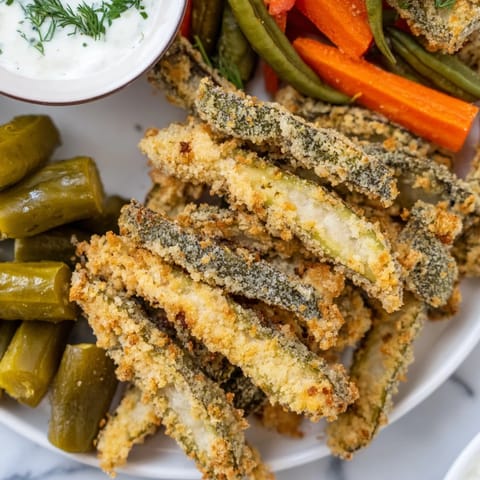 A vibrant platter of assorted pickled vegetables and fried pickles for true enthusiasts.  