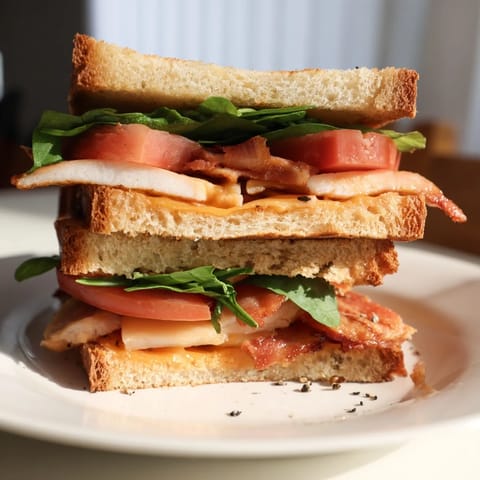 Melted cheese oozes over fresh spinach in this protein-packed Turkey Bacon Grilled Cheese.