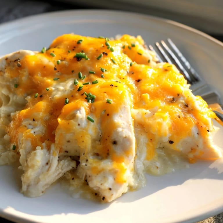 Delicious Cheddar Ranch Chicken Bake drizzled with ranch dressing, flavorful and easy to prepare.