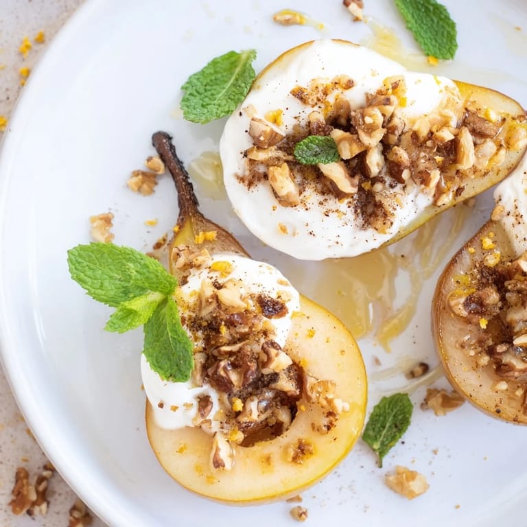 Image: A delightful serving of roasted pears with cinnamon, nuts, and yogurt drizzled with honey.