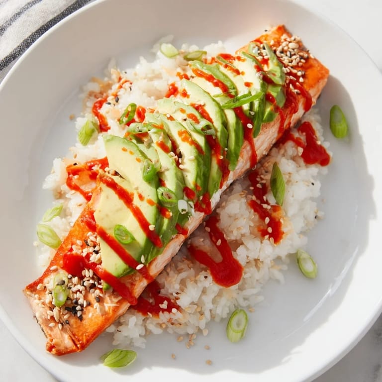 Enjoy a quick and easy Classic Salmon Rice, with perfectly flaked salmon pieces and savory flavors.
