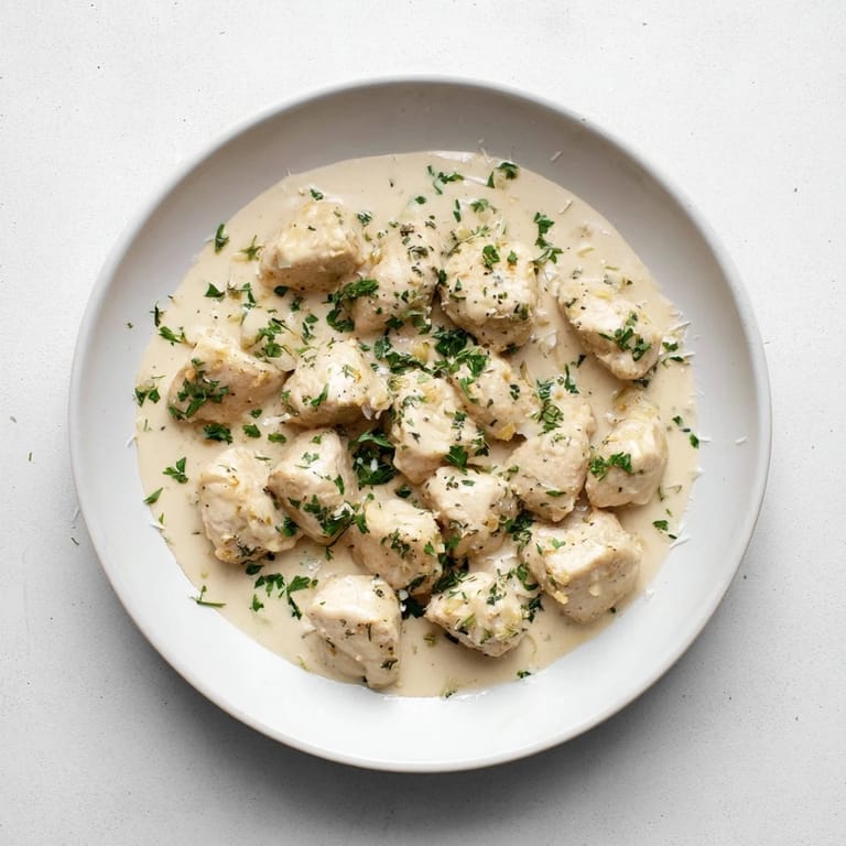 Tender Creamy Garlic Chicken Bites smothered in a velvety garlic sauce, perfect for a quick weeknight dinner.