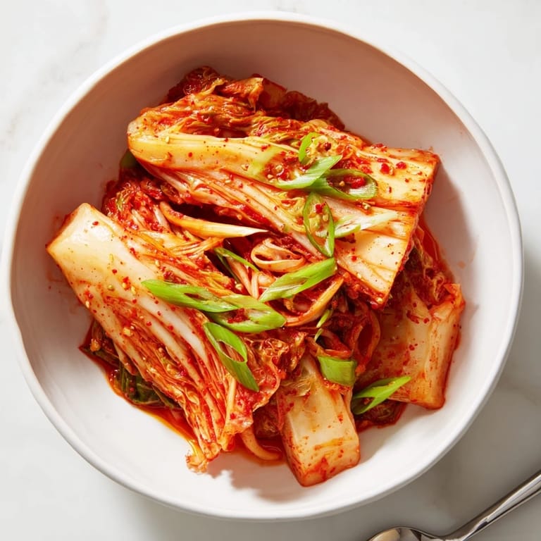 Golden hour lighting highlights the glossy texture of this traditional Korean side dish, perfect served alongside a steaming bowl of rice.  